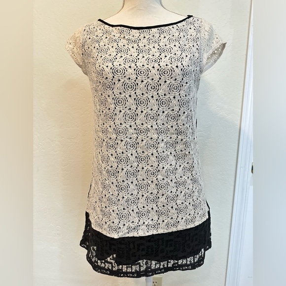 Anthropology Weston Wear Women’s XS
Black and white lace top with short sleeves - Picture 1 of 9